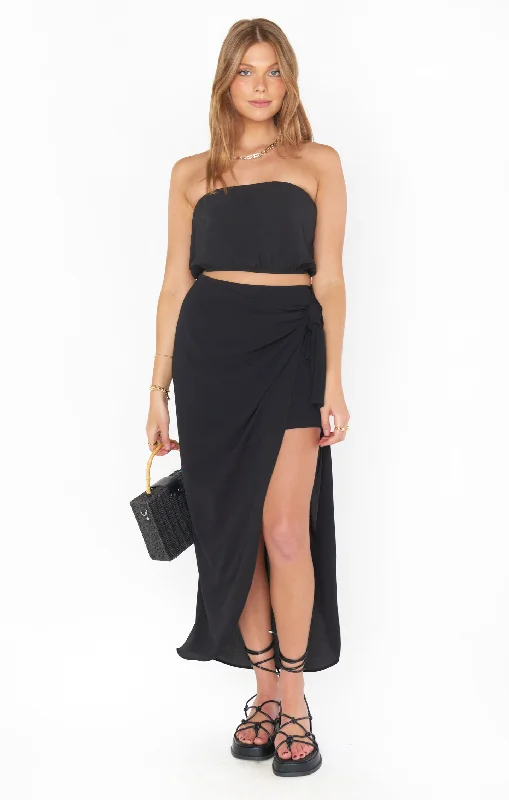 A-line skirt – Skirt that is fitted at the hips and gradually flares out toward the hem.A-line skirt – Skirt that is fitted at the hips and gradually flares out toward the hem.Wrap Me Up Skirt ~ Black