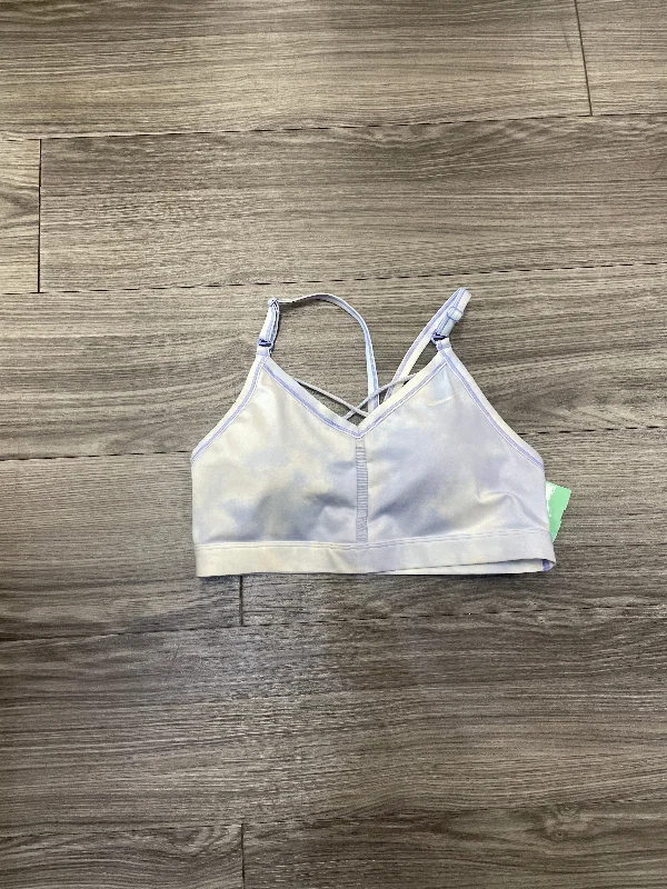 Yoga sports bra – Lightweight and comfortable sports bra designed specifically for yoga, offering gentle support.Yoga sports bra – Lightweight and comfortable sports bra designed specifically for yoga, offering gentle support.Athletic Bra By Nike In Purple & White, Size: L