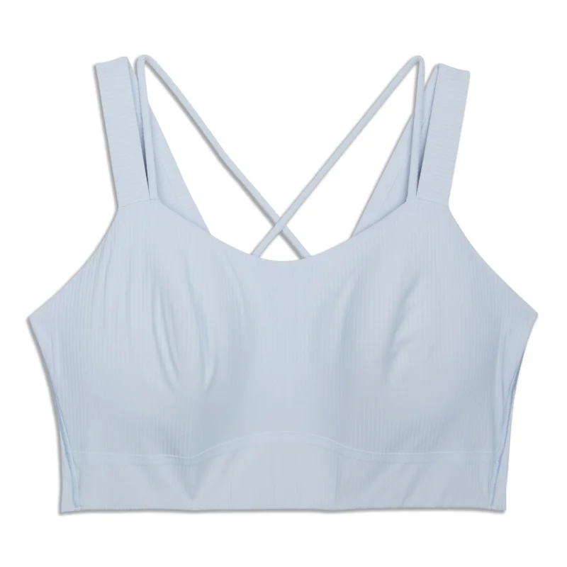 Crossover sports bra – Sports bra with a crossed strap design at the back, offering a stylish and supportive fit.Crossover sports bra – Sports bra with a crossed strap design at the back, offering a stylish and supportive fit.Like A Cloud Longline Ribbed Bra - Resale