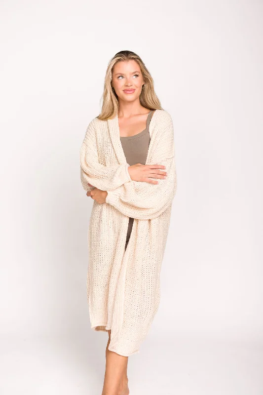 Waffle knit – Textured knit resembling a waffle patternWaffle knit – Textured knit resembling a waffle patternFrancie Knit Balloon Sleeve Cardigan in Powder Beige Waffle knit – Textured knit resembling a waffle patternWaffle knit – Textured knit resembling a waffle patternFrancie Knit Balloon Sleeve Cardigan in Powder Beige